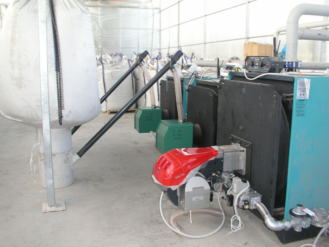 Pyro 250 Pro Installation of 2 Wood Pellet Burners in oil fired boiler in a greenhouse in Athens - Megatherm
