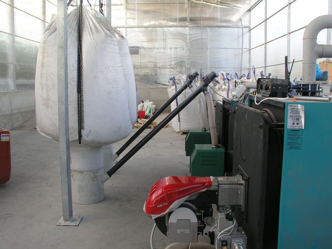 Pyro 250 Pro Installation of 2 Wood Pellet Burners in oil fired boiler in a greenhouse in Athens - Megatherm
