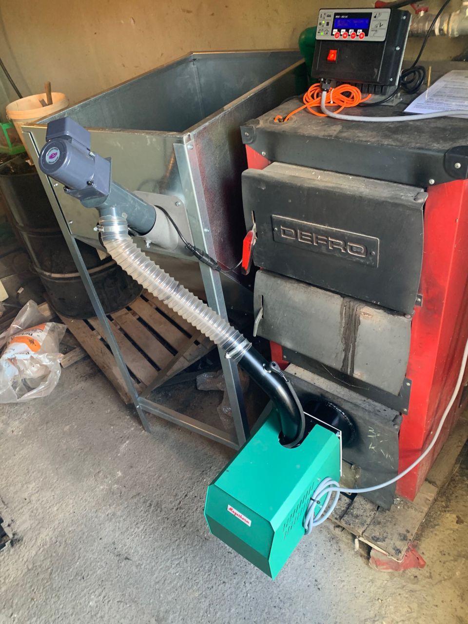 Installation of Nani 35 Wood Pellet Boiler by Megatherm Wood Pellet Experts