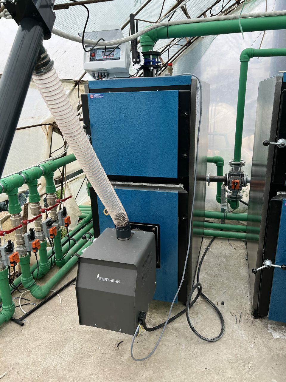 Pyro 150 Pro wood pellet burner installed in greenhouse in Greece