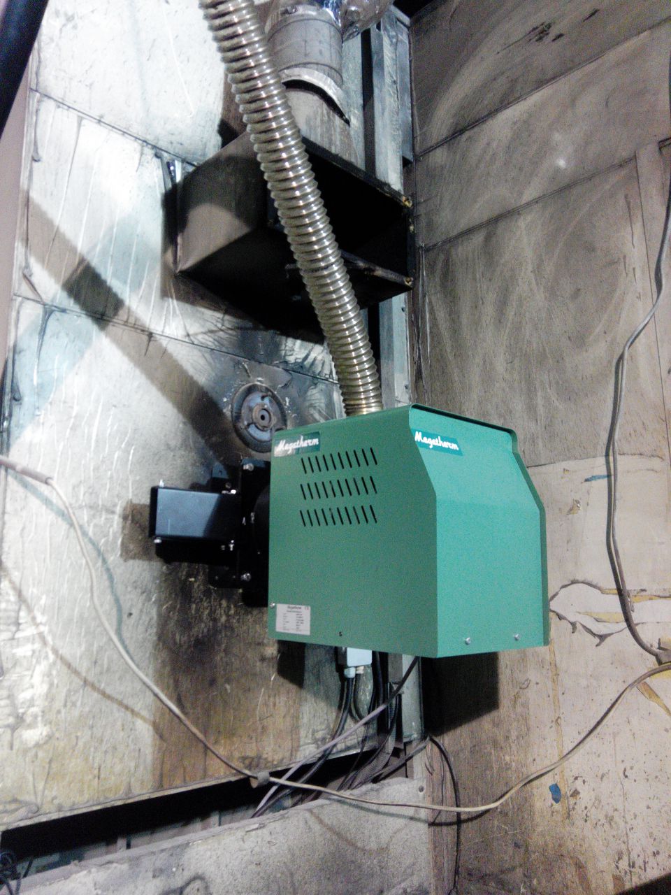 Pyro 150 Pro Instalación de quemador de pellets en un taller de pintura de automóviles en Portugal - Megatherm